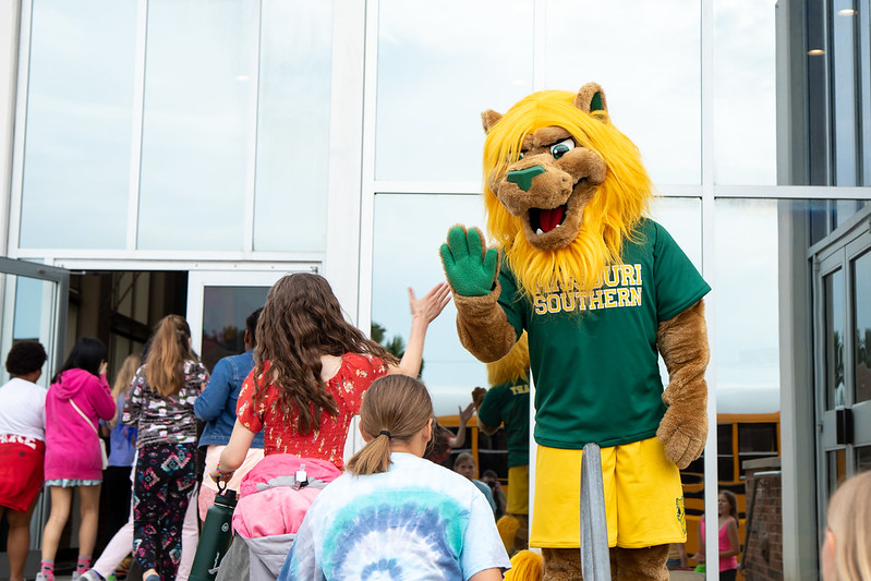 students with mascot